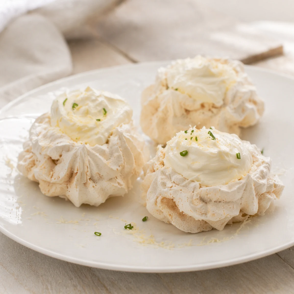 Best Wine Pairing for Meringues with Double Cream and Gruyère